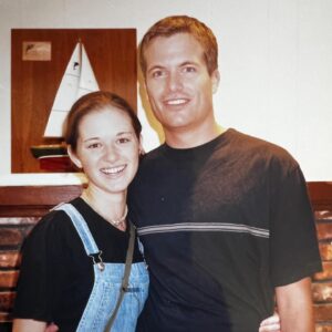 Sarah Drew Instagram - Look at those babies. 🥰🥰 This is our first picture together. My over tweezed eyebrows, oversized t shirt and overalls totally won his heart. And good lord look at him! Hottie pants! 😍😍I was 18 and he was 22. Our first date - after writing and talking for 8 months. I love this man. So grateful we found each other so young. Could not do this life without him ❤️❤️