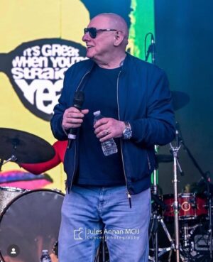 Shaun Ryder Instagram - Great shots of Black Grape on the main stage at Lakefest 9.8.24. 😎
.
📷: Jules Annan MCIJ @concertphotography 
.
#BlackGrape #ShaunRyder #KermitLeveridge #Lakefest #Livemusic
