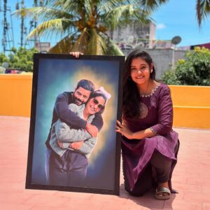 Sruthi Shanmuga Priya Instagram - For every moment you lose a little hope, the guardian angel whispers “Don’t worry, I’m here with you”. Just like the image in the frame, you hold me tight everytime @arvind__shekar . This picture is so special to me 😘

Received this beautiful digital frame when I was strongly looking for a sign. Thank you so much @tamilankadaii for being so kind. This is the second frame they’re sending me. First one was a frame that had ARAVIND’s voice in a QR code in it  and this one goes straight to our living room. Thank you for such a beautiful memory. It’ll be cherished forever.