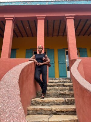 Stacey Plaskett Instagram - During my time in Senegal with the House Intelligence Committee, I observed the rich connections and similarities between Senegalese cultural practices and the culture and folklife that I and many other Virgin Islanders grew up with. Traditions of storytelling, dance, and hair braiding were brought to the Caribbean from Senegal and other West African countries during the slave trade. 

Today, those cultural imports can still be seen in the spiritual stilt dancing of our Moko Jumbies and the hair braiding practices in both Senegal and the US Virgin Islands. Teachers! As the school year begins, I encourage you to employ The Smithsonian’s Learning about Folklife: The U.S. Virgin Islands and Senegal (https://buff.ly/3LYpsn8) teaching guide to educate our youth on the rich history and complexities of the African and Caribbean diaspora.

And of course, I took time for Goree Island to make libations to the ancestors and come back through the Door of No Return.