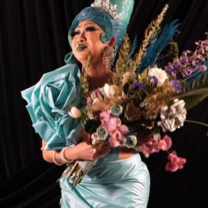 Suki Doll Instagram - Your new "Miss Fan Favorite" 
.
Glad to be your new Miss Fan Favorite and Miss Best Actress, jokes aside Drag is all about the fun and entertainment. Enjoy our art and our performances it does no harm to anyone. We just want to share our passion and art form! 💛

Thank you to @oxide_design_floral for the gorgeous bouquet that is going through my rough shaking!
.
Video by @jocelynleduc_ 
(Direction   Editing   Motion Design)
DOP by @jeansebastiensenecal
Outfit by @_thesukidoll
Styling by @poe.mtl
Hair by @petula_claque
MUA by @_thesukidoll
.
#thesukidoll #misscongeniality #dragfun