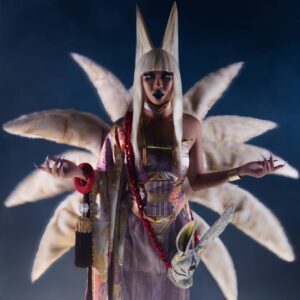 Suki Doll Instagram - SUKI X HULI JING
.
The nine-tailed fox folklore belongs in the asian culture. The entity is a shapeshifting spirit from woman to fox. This vision has been sketched by me and crafted to perfection by our two master cosplayer @tsukinostardust
.
Concept by COLLECTIVE DOLLMINATION
@collective_dollmination
.
Art Direction by @jocelynleduc_
Photo by @jeansebastiensenecal
Styling by @poe.mtl
Outfit made by @tsukinostardust
Hair by @stephane_scotto_di_cesare
MUA by @_thesukidoll
.
#cosplay #ahri #thesukidoll #ninetails