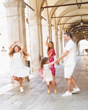 Tammin Sursok Instagram - We came, we saw, we walked 20k daily steps, we conquered, and we sweated our faces off. Venice, I love you and I'm coming back when it’s fall next time 🤪 
Ok so here are the takeaways from Venice with kids in two and a half days…. 
1- If you go in summer. Its hot. Like very hot. And very crowded. Which can be a positive when you want ambiance. But without our neck fans, constant breaks, and a crap load of iced water, it wasn't easy. 
2- Don’t be upset if your kids aren’t as thrilled at the museums and palaces as you are. I completely fell in love with Venice all over again, especially its architecture and churches. But I'm not sure the kids appreciated it as much as I wanted them to. They were more excited by the gelato 😂 
3- Don't just stay in Venice. We went to the glass blowing in Mureno which cost $10 euros and the beach in Lido. Both worth visiting and a short ferry across. 
4- There is a LOT of amazing food. But it’s worth searching for it then just walking into a tourist spot - if you're a foodie like me you’ll be disappointed unless you're in the know. 
5- If you can, take a gondola. Definitely better than the ones in Vegas 🤣 I preferred taking one at night as it’s magical with the lights, not as hot and and crowded as the day time. 
6- Book a photo session! I booked this one through @airbnb with @jsphotovenice and @miri.take took these photos. So reasonably priced and they do an awesome job! 
7- All gelato is NOT created equal. Sometimes it’s mind blowing, and others it’s like mediocre ice cream. One of my rules is if it comes out of a silver tin like @gromgelato you're going to be happy. If its in massive mounds, not so much. 
8- See the tourist attractions an hour before they close. The kids were tired so I saw some main sights alone and they were almost empty. The Doge’s Palace was a highlight for me and I almost had it to myself! And go see the show Titize!!!
9- Venice is expensive BUT there are many things that are inexpensive. Gelato is $2.50 and pizza is $3.00 and there are hotel options at a budget. 
10- Venice is Definitely worth seeing. Next time we will be coming when it’s cooler! 🥵🤣Comment below.. Off to Puglia tomorrow! #venice #italy