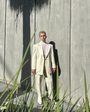 Tanner Buchanan Instagram - Just here to prove you don’t need a black belt to rock an all white fit. 

Styled by @avoyermagyan 
Grooming by @abrajamiecline 
Look by @thetailorynyc 
Jewelry by @davidyurman