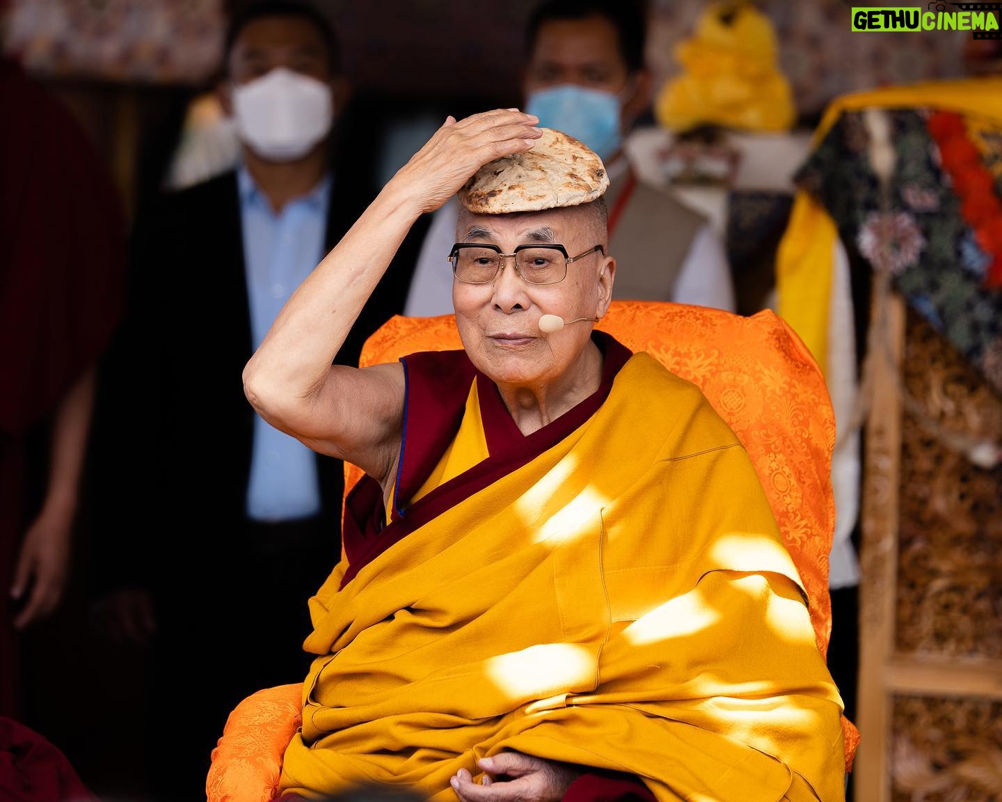 Tenzin Gyatso - 74.3K Likes - HHDL playfully using a piece of bread as a hat when advising the students to cover their heads from the sun during the tea break of his meeting with youth from Zanskar, Ladakh, UT, India on August 13, 2022. Photo by Tenzin Choejor #dalailama #zanskar