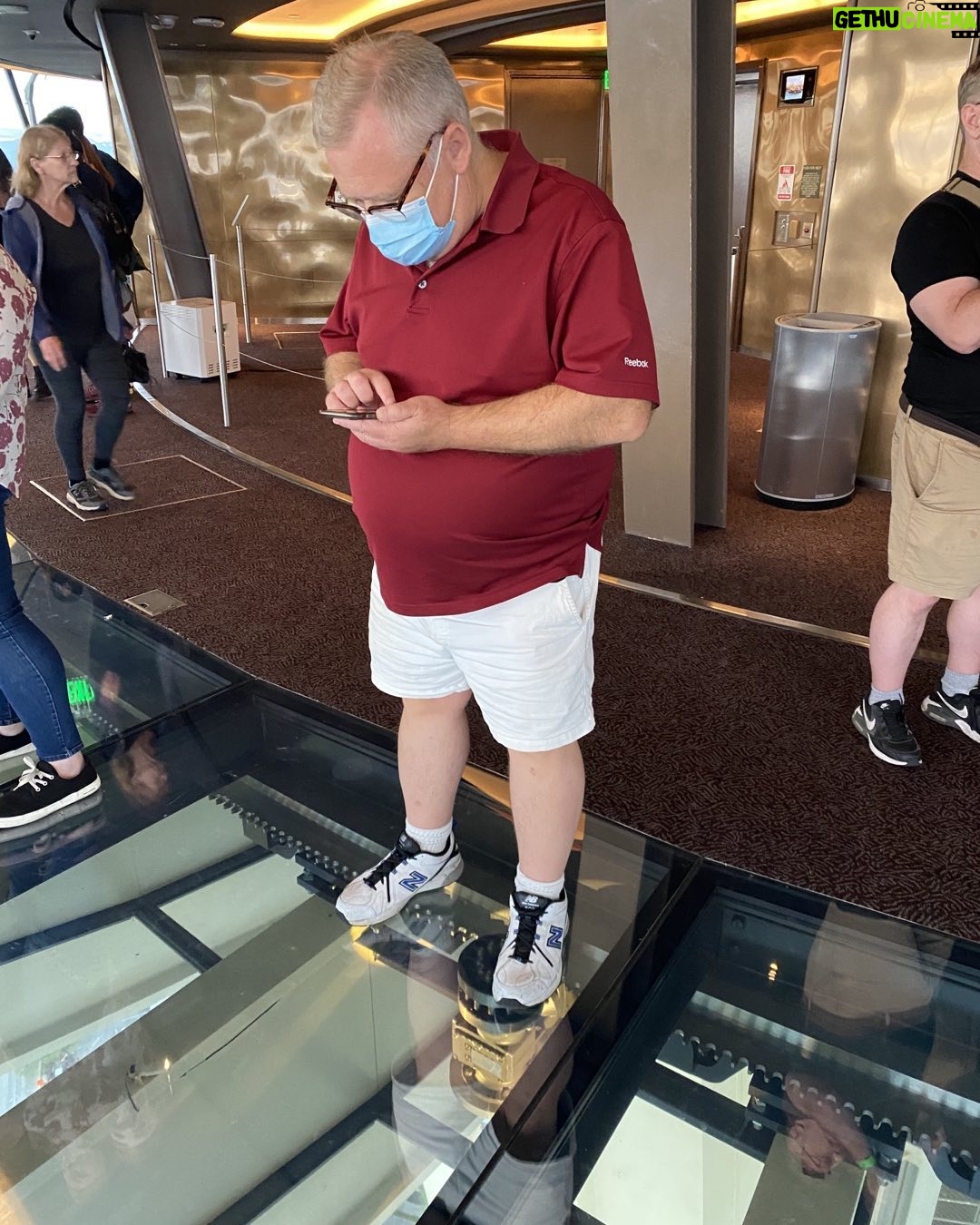 Tim Hooper - 3.5K Likes - Standing on the glass floor taking pics