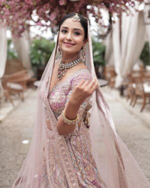 Tina Philip Instagram - Embracing the magic of a thousand dreams in this bridal lehenga ✨
.

Outfit: @bawreefashions 
Clicked by: @memoriaproduction 
Jewellery: @jazzy_the_rentals 
Hair and makeup: @nandanisandha_ 
Location: @truetrammtrunk
