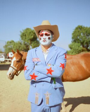 Todd Smith Instagram - Cowboy Clown @todderic ⭐️
Photographer: @carianneolder 
Producer: @polderexpress
Videographer: @bysammismith
Makeup: @downtoclownmakeup
Stylist: @brandenruiz
Custom suit: @stonedbymegs
Boots: @pskaufman 
Location: @lilbarnridingschool
Shot on @kodakprofessional #kodak200