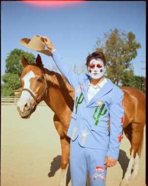 Todd Smith Instagram - Cowboy Clown @todderic ⭐️
Photographer: @carianneolder 
Producer: @polderexpress
Videographer: @bysammismith
Makeup: @downtoclownmakeup
Stylist: @brandenruiz
Custom suit: @stonedbymegs
Boots: @pskaufman 
Location: @lilbarnridingschool
Shot on @kodakprofessional #kodak200