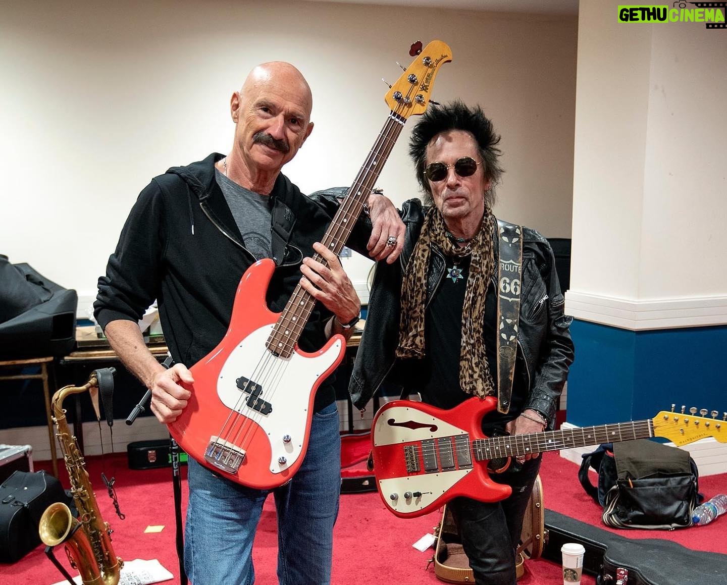 Tony Levin - 7.5K Likes - Here in Liverpool for the Intl Beatles Festival, Earl Slick, Andy Newmark and I haven’t all played together since the 1980 Double Fantasy sessions! Biggest surprise: Earl and I accidentally somewhat coordinated our axe colors. (I've got my Coral Red MusicMan Cutlass, 2 strings flatwound, two roundwound - no frills! He brought his Dakota Red Nash guitar.)