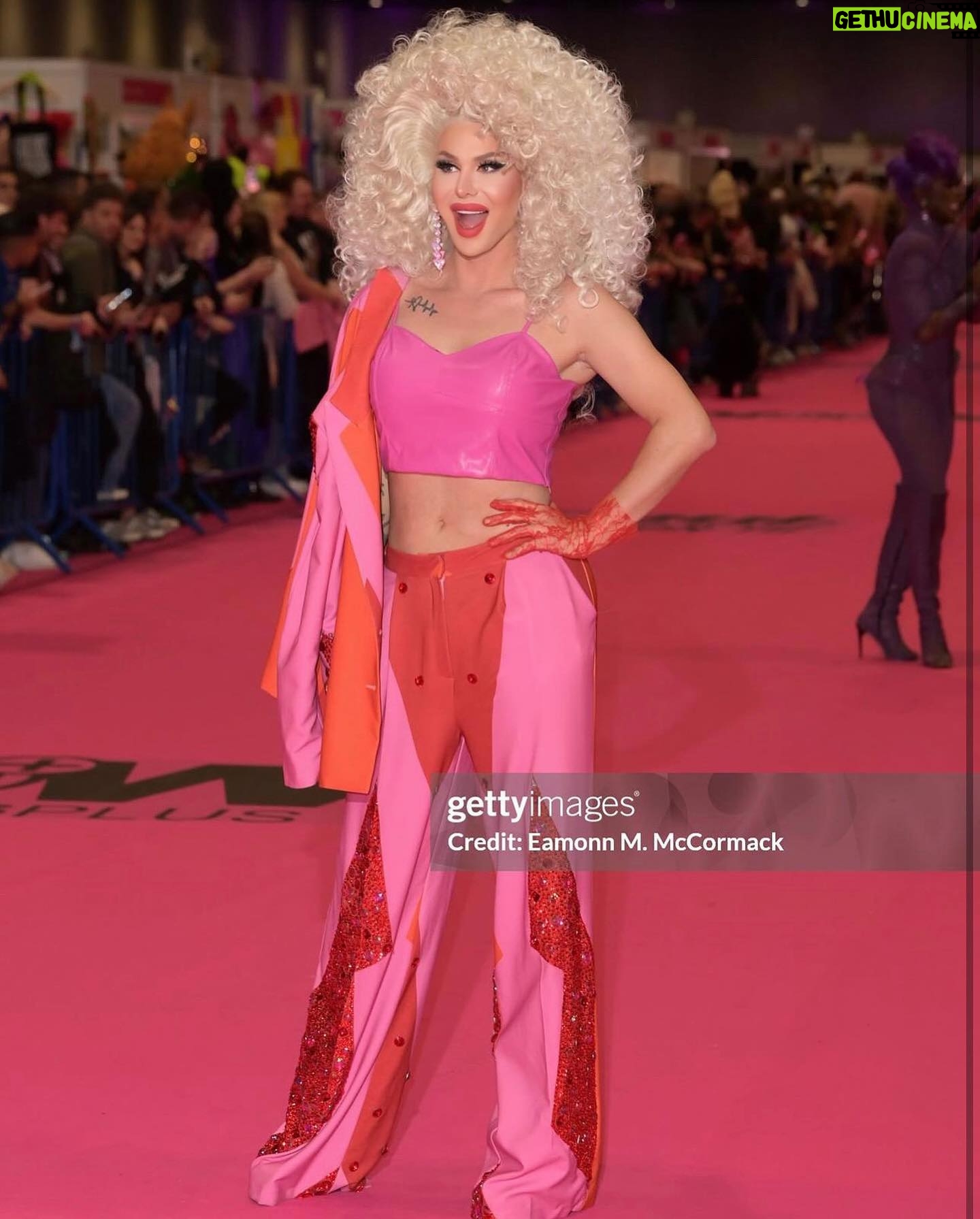 Trinity the Tuck - 20.3K Likes - What an incredible weekend at @rupaulsdragcon UK! Thank you all who came to visit me at my booth! It was my pleasure to talk to each of you! Thank you to my team of Tuck Support who helped facilitate such a professional and easy work space! Iāll see you at the next one ! Hair by the incredible @baehmbaehmwigs suit embellished by @natalia_at_nite and the amazing blue jacket by @mr_riegillio . Jewels by @ampedaccessories . Photo credit by @stunnin.mag and @gettyimages
