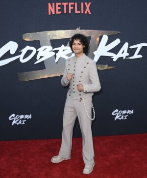 Xolo Mariduena Instagram - Thank you to all who showed up at the premiere yesterday. To wrap up this show with all of our supporters is a gift. Cobra Kai Never Dies! Part 1 out now. Custom Threads by @ugomozie.