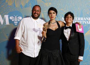 Yasmine Al Massri Instagram - So proud to have shared this celebration with Palestinian brother @fleifel who won the jury prize .. met the legendary casting director Margery simkin and did unlimited amounts of  selfies with my favorite plus one, soul of my soul .. thank you @mediterranefilmfestival for this honor .. @thestrangerscasemovie brought a lot of great people together to make it happen.. it’s the labour of hard work and love for cinema but also desire to make cinema serve a higher purpose then just popcorn and shock u .. 📸 @tnicholsonphoto #brandtandersen @philistinefilms @ossamabawardi @ziadmbakri @sara.el.debuch #yahyamahayni @omarsyofficial @constantinemarkoulakisofficial @angelikipapoulia @thanostokakis @salehbakriart @fareshelou @jay.abdo @massa.daoud @farahj.mu @siwwi__  @ariel_cine @bill_hazzam @ramifarah1807 #jasonbeghe