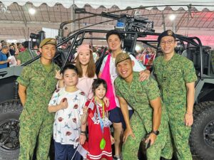 Yvonne Lim Instagram - Well we couldn't attend NDP this year but we still managed to attend South West District NDP@Heartlands family friendly activities 🇸🇬🥰
.
Carrying our NDP packs, my heart swells with gratitude as we combed through the crowd, greeted with warm welcomes from fellow Singaporeans and met our amiable @lowyenling.sg 😍
.
The amazing static displays of SAF, SPF and SCDF vehicles were what got #happyAJ really excited. Much credit to all SAF, SPF, SCDF personnel and volunteers at the event, 辛苦了！🫶🏻
.
Of course the night ended with spectacular drones display and fireworks! 🎆 
.
I am so proud to call this country my home. Here's to celebrating our unique culture, history, and unity that makes our nation so special. I love my country, today and every day!🇸🇬❤️
.
#ndpatheartlands 
#southwestdistrict
#HeartsToGather
#happy59thbirthdaySingapore
#TogetherAsOneUnitedPeople
#SG59
#proudtobeSingaporeans
#lovemycountry🇸🇬
#dutifulgodparents😜
#myjoyandhappiness
#mysunshine
#happymummy 
#happyAlexa 
#wearetiens
#国庆日
#田家趴趴走
#田家过国庆
#新加坡女婿
#平安
#健康
#感恩
@ourbukitgombak