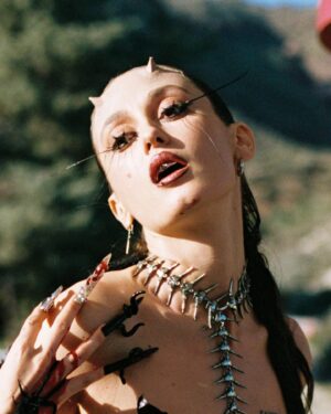 Alina Pash Instagram - If you’re bold enough to peep my custom silver grillz from the one and only @AlligatorJesus, you’ll spot a secret word — and trust me, it’s got something to do with you too 💀❤️
_________
Photo @daniel.rubinshtein 
Photo @tony.muhin
