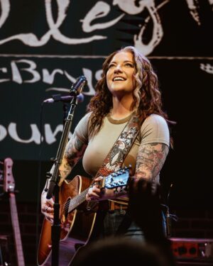 Ashley McBryde Instagram - This is all because of, and for, YOU. Thank you, Trybe, for a night of togetherness !! Let’s “bad old days“ together again soon !! 

📸: @hayleyshoots