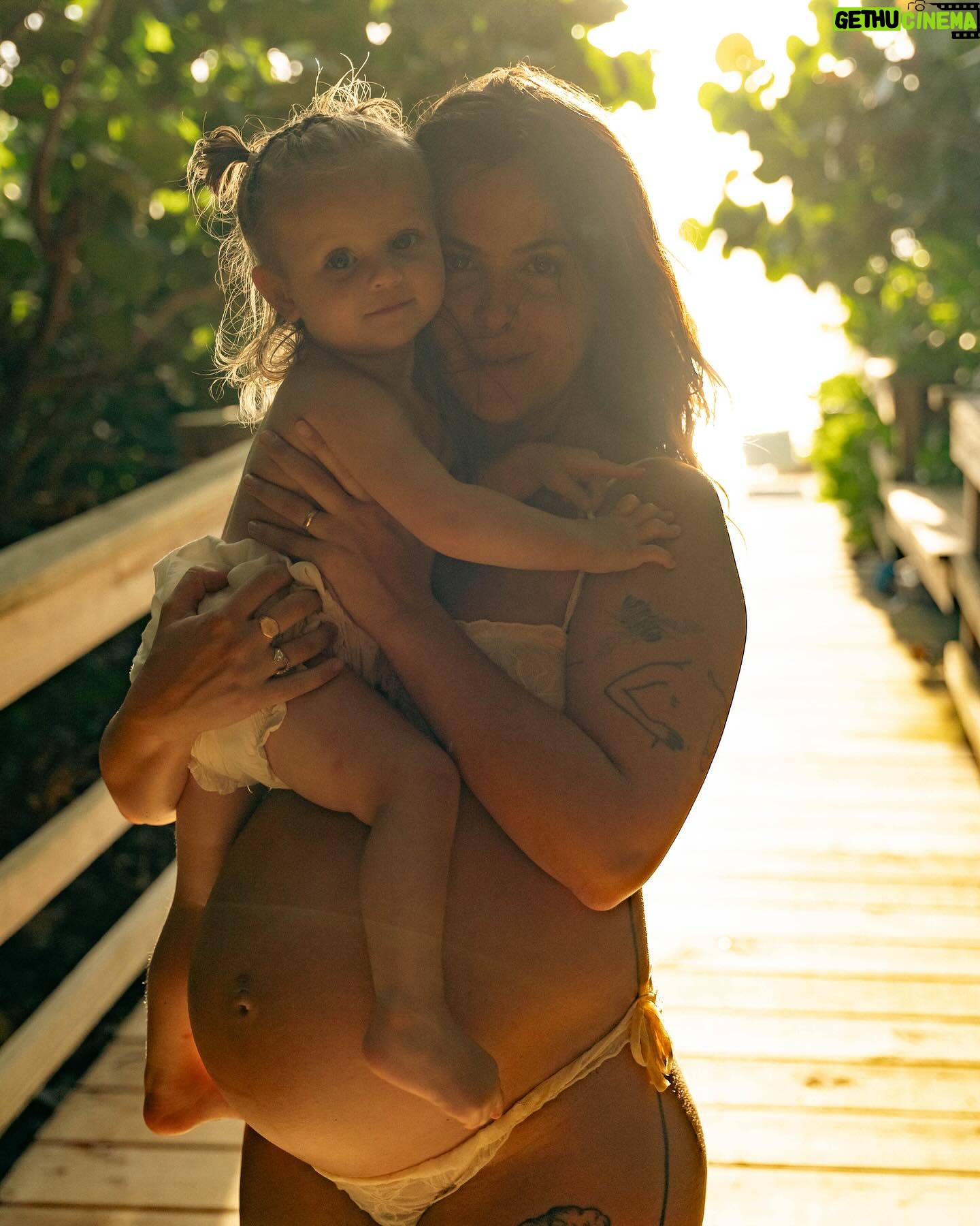 Bethany C. Meyers - 16.2K Likes - Sharing the best photos I’ve ever taken in my entire life. Please enjoy round 1 from our maternity shoot.
This is our little boardwalk to the beach. When we first moved to Florida in January, Kilmer was 10 months old. Each time we went to the beach, I would let her crawl down the boardwalk and think to myself, soon she’ll be running down this thing.
I just so happened to get pregnant the same day we moved to Florida. And soon, she was running and I began to envision pregnant me walking with Kilmer down this path. And lately the visions have shifted to holding a newborn in one arm and Kilmer’s hand with the other while making our way to the ocean.
This little boardwalk has become a special place. Big blue crabs often hide in earth surrounding us. We’ve seen snakes and birds and all kinds of critters that have made it a fun stop. It’s the shade from the sun, the place we swat mosquitoes and the spot where we strip down and wash the sand off our body while playing in the hose water.
I wanted pictures with her here so badly and @createanomaly made that dream come true. I’ll always think fondly on these special moments together. Life before two. Just me and my first in barefoot exploration.