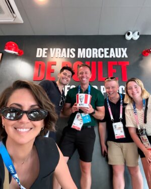 Brooke Boney Instagram - I had friends come visit who I managed to squeeze in hugs and fun with in between doing crosses and spending time with the families of the athletes. @cstanaway shouted our team a family feast from French KFC on a 35 degree day in an hour between rugby matches at the Stade de France. I watched brothers and sisters cheer on their siblings even though they didn’t place because they were so frigging proud they got as far as they did. We took naps on the floor between broadcasts because we were glued to the coverage and couldn’t leave the compound because security was so tight 🇫🇷