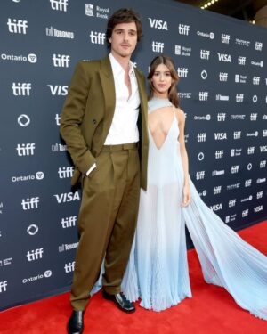 Daisy Edgar-Jones Instagram - Wearing the bluest most gorgeous @gucci dress, @sabatods I 🩵 you. Thank you @tiff_net for having us for On Swift Horses. The puppies and cowboy hat was much appreciated,  and the 🤠 will be added to my growing collection. This festival was the perfect place to premier our film and thank you for such a warm reception. 

Ps there is a beautiful cover of this song Mr Blue in our film and I can’t stop listening to it xx