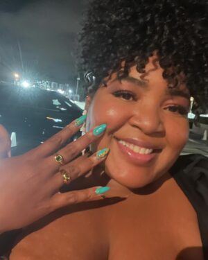 Dulcé Sloan Instagram - Ok last one. My look for the “Night before” Party.
Lemme tell yall about this dress from @lealealoveclothing ! This is the FIRST time in my life I have worn a dress with no bra. And they are sitting! Y’all hear me?’ Go buy 5 dresses! 10! I’m definitely getting more! And doesn’t my big lil bro @ronfunch look adorable?!?!

Dress: @lealealoveclothing 
Earrings: @capucinedewulf 
“atl” Necklace & Rings: @admiralrow