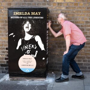 Imelda May Instagram - I’m so honoured to be recognised by Dublin Canvas in celebrating the living…! Thank you so much! 

Steve O’Toole (@urnique.steve ) the artist who started this initiative explains…

“Ireland is very good at commemorating & remembering our dead but we do little to celebrate our living. There are blue plaques all over Dublin to remember and mark how ‘Oscar was born here, Behan drank there, Joyce etc. and only in death Sinead, Shane and many many more are justly & rightly celebrated but whom in life were never given the accreditation they so rightly deserved. 

And so my Dublin Canvas submissions began last summer with  ‘Pat Ingoldsby’s … Welcome To His Head … Complete with ‘Not Dead Yet’ Blue Plaque. 

Continuing this year with ’Imelda May … Mother of all the liberties… With accompanying ‘Liberties Belle’ Blue Plaque. 

* Mother of all the Liberties - A nod to the hierarchy & history of the women of the Liberties, and to Imelda’s current role in MOATB. 
* Liberties Belle - Reflecting on both ‘The proudly born Liberties Imelda’ and to Imelda’s own wonderful piece ‘Liberty Belle’.  

On seeing Imelda’s reposting of Celia’s ‘Highly Commended’ in the Arts & Entertainment category at the British Press Photographer of The Year Awards, and Imelda’s accompanying copy …
‘This photo of me from Cambridge Folk Festival last summer. Sinéad had just gone. I painted my top impulsively Put on my mother’s chain, my Jeff Beck pendant. Walked onstage with my band and sang with all my heart. Emotional night captured. Friendship forever’. 
I knew instantly this was the only image to use. 

I cannot emphasise the outpouring of Liberty love & fondness for both Imelda and her family that has not only been expressed to me but also in turn extended to me by association. I am really going to miss working on this much loved piece.”

📸 on Meath St also by @ailecphoto

@dublincanvas 

#ImeldaMay 
#TheLiberties #TheLibertiesFestival #TheLibertiesDublin 
#DublinCanvas #DublinCanvasProject #DublinCityCouncil 
#ThisIsDublin #DublinEvents #Dublin8 #Dublin #Ireland