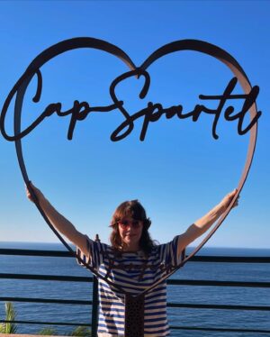 Jenny Lewis Instagram - big news from the @postalservicemusic euro tour!  not only did we return to the UK, spain & portugal after 21 years to play for oodles of folks but after ten years of eating zero gluten 
in paris i chomped many croissants & several baguettes and felt totally great. 
sea change moment for your gal !
also, @jimmytamborello and i went to Tangier 
and stayed at the beautiful @villamabrouka 
thanks to @gq for featuring it in the mag almost a year ago.  i cut it out and put it on my refrigerator and manifested this amazing trip. 
i read burroughs & bowles and the 
splendid and the vile and got a paint sample from the very cool staff at the villa 
so that i can bring a little bit of morocco back to the canyon.  madrid was amazing and bumping into @harrystyles at the fest was a total unexpected highlight !  i moved into the @hotelsamourparis for a few nights and felt right at home. 
also, hanging with  @joshuaradin @annakloots & @zachbraff was so fun & now 
this song will forever be in my head 
cue 
les champs-elysées 
one last @postalservicemusic show to go 
😭😭😭😭
and only three more shows to conclude the JOY’ALL era. 
it’s been a busy and joyful year & @bobbyrhubarblewis and i thank you 
and say 
BLESS!
cool 📸 by @saladjockey