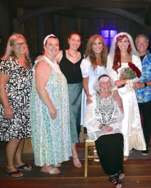 Jodi Benson Instagram - When Delaney was 4 yrs old, I brought her up on stage with me during my concert. I did a little interview with her before I started to sing my song “Part of Your World”. I asked her what she wanted to be when she grew up. She very quickly and confidently took the mic out of my hand and said , “I want to be Ariel when my Mommy dies!” Of course the audience broke out in laughter and so did I. She then started singing my song and didn’t really want to give the mic back to me. 
I knew in that moment that Delaney would one day become Ariel. 
My sweet girl, you truly were born to play Ariel. You made her your very own. You were so brilliant. You infused your joy, your humor, your passion and your love into every moment of her story.
It’s hard for me to find the words to express how I felt as I watched you on stage. I was and am so incredibly proud of you. Your vulnerability, strength, grace, courage, authenticity & confidence brought me to tears. Your voice was stirring & stunning and your version of “Part of Your World” was filled with such passion & determination. 
I love you, Delaney🩵
I’m honored to pass my treasured dinglehopper to you. 
You are, and always will be, my Ariel🧜‍♀️

…oh, and I’m so thankful I was still alive to see you become Ariel!😂