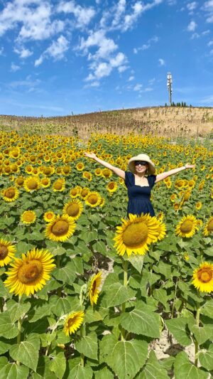 Judy Joo Instagram - I have had a long love affair with Italy…. And, I couldn’t resist adventuring into this golden field of sunflowers. 🌻 
Ah, Italy… amazing food, people, and scenery!