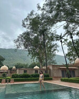 Juhi Godambe Instagram - A rainy swim 🌂🌴