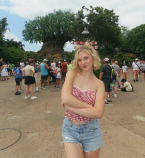Lily Brooks O'Briant Instagram - Moments in Florida ✨
1. beach days are the best days 
2. the best shaved ice I’ve ever had omg 
3. Rawr 🦁 
4. soooo… the Harry Potter ride caught on fire while we were riding it and the fire alarm started going off & the lights turned on but the ride kept going 💀
5. Prettiest sunset from the plane 🌅
6. Emma’s face omg 
7. I never wanna leave 🏝️
8. when u & your long distance bestie reunite>>
9. EPCOT BALL 😍
10. best nap of my life omg
11. my lifelong dream of being the can can dancer at Hoop Dee Do Revue finally came true
12. animal kingdom 🍃
13. selfieee
14. more beach picsss
15. my fave ride in EPCOT
16. airport fit check ✌🏻