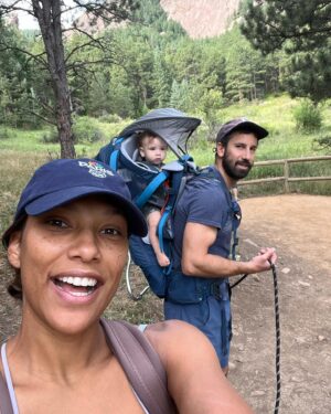 Meagan Martin Instagram - One of our favorite things to do these days are family hikes! Indy absolutely loves being outside and in the hiking backpack! Can’t wait for more of this as the fall temps roll in. Brought a post hike treat that always hits the spot @athleticbrewing 🍻! #brewwithoutcompromise