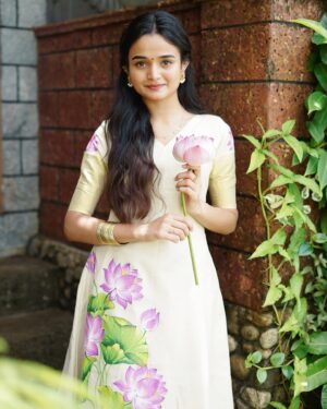Meenakshi Anoop Instagram - #thamarapoovil 🪷🦢
 Beautiful dress from @gourishankaram_arts 👗🪷