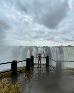 Pearl Thusi Instagram - My version of TLC is chasing water falls … 🌊
Waterfall rain hits different… the drip is crazy!

PS. Hope to have another adventure with you @chlomoolala 🤞🏽🤍

Would you love to visit Victoria falls?