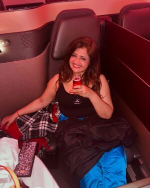 Roshni Walia Instagram - "The song perfectly matches my mood because I absolutely love traveling 🤪This flight was incredible, and I can't wait to explore more with my mum @sweetywalia11 . A huge thank you to @qatarairways for taking such good care of her when she got sick during our trip—you really went above and beyond. This post is all about sharing my happiness, my experiences, and the personal growth I'm experiencing. It's not about showing off, but about expressing love and gratitude."🙏 🧿🌍
