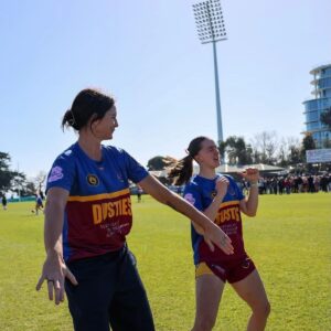 Sharni Layton Instagram - PREMIERS!!!! What a bloody pleasure being involved with the mighty Dustie's this year @warragulindustrials (who are an absolute VIBE btw) 

I'd love to say it was my heroic round 1 efforts (which proved my expertise now lie off the field 😂) or my sporadic 5 min inspo rev ups.. but really, it was an incredible group of hard-working humans who gave a shit about each other.

With 5 goals & 4 lead changes in the last 8 minutes, it was such a great spectacle of Div 1 MPFNL. 

Congrats Scottie, the gals & everyone involved. Very cool to win a flag in your second season in Div 1 😎

Up the Dusties!!🥇