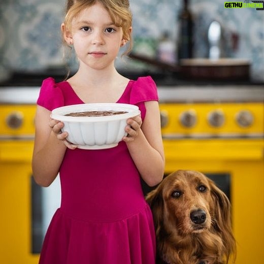 Silvia Colloca - 1.9K Likes - One of my favourite shots by @alan_benson_photographer for my latest book, ITALIAN FAMILY FOOD. Luna and Mabel captured in magical light, like characters from a quirky Wes Anderson movie.
Mabel (canine) is showing the signs of that longing that only chocolate pudding (which Luna, human, is stoically carrying in a retro Tupperware mould) can inspire.
❤️🇮🇹 🐕