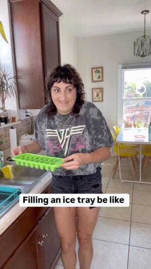 Steph Tolev Instagram - But why does it have to be this hard?! #funnyreels #icetray #jokes #wet #fail #fall #stupid