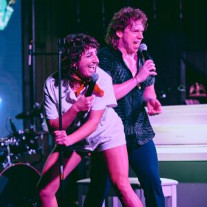 Steph Tolev Instagram - SLIP, SLOP & SLIDE absolutely SLAPPED!! Can’t explain how much fun we had on stage and guess what this will be happening AGAIN!! Thank you @sarahrosephoto__ for capturing this magical night and @longtimenoseecomedy for putting this on 🥰🥰🥰