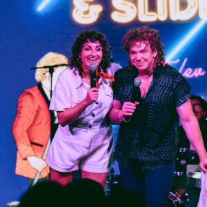Steph Tolev Instagram - SLIP, SLOP & SLIDE absolutely SLAPPED!! Can’t explain how much fun we had on stage and guess what this will be happening AGAIN!! Thank you @sarahrosephoto__ for capturing this magical night and @longtimenoseecomedy for putting this on 🥰🥰🥰