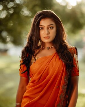 Varshini Suresh Instagram - 🧡

Outfit: @shethala_the_custom_clothier 
Cam & edits: @selva_sk_dop 
MUA: @artistrybymadhumitha 
Hairdo: @br_makeupartistry 

#newpost #explore #explorepage #fyp #viral #trending #trendingnow #trendingsongs #manasilaayo #rajinikanth #manjuwarrier #dance #photography #outdoor #outdoorphotography #outfitoftheday #orange #saree #traditional #outfit #ootd #fashion #varshinisuresh #neenaankaadhal #vijaytv #neenaankadhal #tamil
