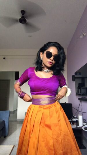 Amritha Shaji Instagram - Golden sparrow 🐤💜🧡 #amrithashaji