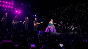 Eliotte Woodford Instagram - It’s still settling in that The Eras Tour is done. I’ve noticed that all of us involved are still going through the wave of emotions and trying to process it all. It’s evidence of how deeply this affected all of us and it will probably take a long time to wrap our heads around it. A 2 year journey that has permanently marked each of us. 

This post is *long* but it’s to say how GRATEFUL I am to know these people. 
Some NEW, some OLD, all FAMILY. 
@taylorswift you caught lightning in a bottle with this group. Thank you for bringing all of us together to be a part of the most epic experience for a performer, musician, human. I am humbled to say I got to share the stage with these superheroes and got to create memories and ridiculous belly laughs on and off stage. The fact that we are all a family comes from who you are and the way you lead with such genuine intention and generosity. 

My bandmates and Starlights - I don’t have words to express my love for each of you. This tour has brought us closer together, more than our previous tours, in such a way that I know we are truly bonded for life. Our love is deep, mature, honest, and silly. I couldn’t ask for better. There was a lot of “life” that happened while we were on this tour, and it was incredible to see how we were there for each other in both hard and celebratory times. 
@smalltown1 @maxephronbernstein @melanienyema @gypsymoonshine - thanks for leading us on the road and keeping this show TIGHT. 
I love our commitment to excellence. 149 shows of 3.5  hours of live music. Wow. We did it!

@davidcook88 - THANK YOU for leading this band to musical perfection and truly caring about the quality of each of us as humans and musicians. Your arrangements made this epic live show FEEL like an epic live show. I am honored to have been under your leadership all these years. Thank you for helping me grow in so many aspects of my life. 

***CONTINUED IN COMMENTS***
