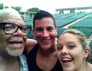 Kate Rockwell Instagram - My papa. My Disney dad. The Muny stage will never be the same without you. The biggest hug you’ve ever gotten from the most fabulous presence to walk on stage. The poise, the bravado, the tenderness, the ROAR of that voice. I will hear you laugh forever. 

My favorite story about Ken was when I learned just how IMPORTANT he really was. I didn’t know his legend when I first met him in 2014, and some part of me knew I shouldn’t look at his resume because I would immediately be intimidated. So I didn’t-until opening night, when I read his bio. And SHRIEKED out loud. And RAN to his dressing room, almost in tears, because I finally knew why his voice sent tremors through me. It wasn’t Old Deuteronomy, or Ain’t Misbehavin’, like a good Broadway fan….but Nightmare Before Christmas, which is (still) my favorite movie of all time. I absolutely lost my mind at him, I’m a terrible fan girl. He smiled that secret Ken smile, laughed a little at me, and on with the show we went. A week later, for closing night, I found my little Oogie on my dressing table, signed by Papa (scroll, it’s still on my fridge all these years later). 

He was a towering presence, literally and figuratively. He was gracious, kind, brilliant, joyful and always in on the joke. I cannot believe you’re gone, so fast, and I will miss you every time I hear your voice. Which will be a whole lot. ❤️