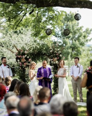 Kendra Instagram - Hailee and Kendra watched a shooting star on their first date and took it as a good omen💫 The pair tied the knot under a canopy of leaves at @fearrington_events five years later, passing a garnet back and forth during a personal Unitarian Universalist ceremony.

Read more about Hailee and Kendra’s special day on our blog at the #LinkInBio!

Featured Heart of NC Weddings vendors:
Venue, Florals, Planning, Cake   Catering  @fearrington_events 
📸 @richardbarlowphoto 

Tap for the full vendor list ❤️
