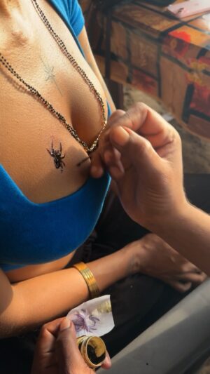Khyati Shree Instagram - I was sitting in a cafe on Kudle Beach in Gokarna, having tea when this guy came and said he does temporary tattoos. I told him I wanted to get something small. He started flipping his catalog and I started scrolling through my Pinterest pins. I found this small spider design saved since years in my feed. This was perfect because I wouldn’t ever get a permanent tattoo placed here and this way I still get to know how it would look if I did. The tattoo turned out sharper than I expected once it peeled out. It's the same ink that is used to mark the fingernails during voting process, so this tattoo won't come out for 10-15 days. #karnataka #karnatakatourism #gokarna #gokarnadiaries #gokarnabeach #temporarytattoo