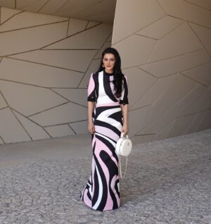 Shalini Passi Instagram - The National Museum of Qatar has left me in awe with its stunning architecture. Designed by Pritzker Prize-winning architect Jean Nouvel (@ateliersjeannouvel ), the building draws inspiration from the desert rose, a naturally occurring crystal formation found in the arid landscapes of the Gulf region. This architectural masterpiece not only captures the essence of Qatar’s natural environment but also its past, present & future. The museum brings to life the peninsula’s natural history and celebrates Qatar’s rich heritage and culture. 
@nmoqatar @fabdoha
Personal Wardobe ✨ ✨ :
Outfit: Emilio Pucci @emiliopucci @laudomia.pucci
Jewellery: Alexander McQueen @alexandermcqueen
Bag: Chanel @chanelofficial
Photographer: @anish_grid

#shalinipassi #missmash #travelwithshalini #nationalmuseumofqatar #architecture #travelstories