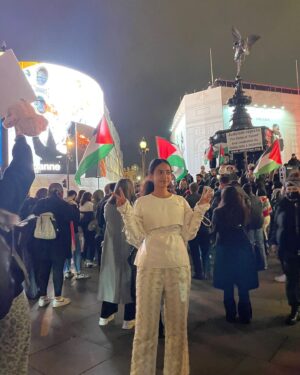 Yumna Al-Arashi Instagram - Yemeni Lebanese and Palestinian flags surrounding one of the most symbolically consumerist spaces on earth while my film RAGE took over the screens. Alhamdillulah.