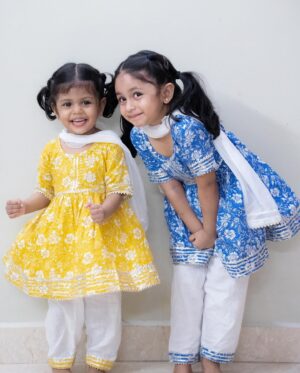 Zara Zyanna Instagram - Can’t contain the cuteness! 🥹♥️
They can do everything! 😂🥹♥️

Explaining the picture series slide to slide:
So they were dolled up for a gollu visit and we chose the twinning combo. Ziva loved the outfit as you can see anything that’s cotton and comfortable adds a smile to her face. Told them to pose for a picture and there you go 
SLIDE 1 Happy pose. 
And Zara really wanted a kiss from her baby sister and that’s the cue. Going down to her is a cue for Ziva to kiss. Hence the 
SLIDE 2 Kiss me cue pose. 
Once the little one got the cue. There you go! 
SLIDE 3 Kissy pose. 
After the kiss they started to play around and walked out of the frame and so the momma said stay in place for the picture. And that’s what they did. Worrying the momma with the Sad face. 
SLIDE 4 Samathhu pose 
and the last one.. couldn’t hold on the drama longer! They both fell over laughing 😂🤣 
SLIDE 5 Candid love pose. 

Which slide/pose is your favourite? 

Outfit: @kidcetra 
Shot by: @praveen.jpeg dada 🥹♥️