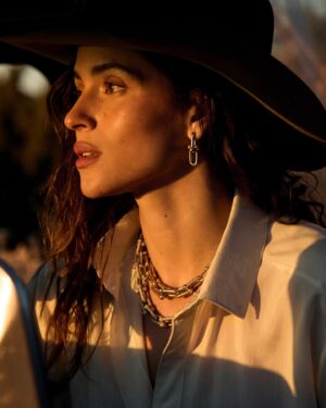 Adria Arjona Instagram - Where we spend the holidays may change, but I can always bring a piece of @TiffanyAndCo with me wherever I go. #ATiffanyHoliday
