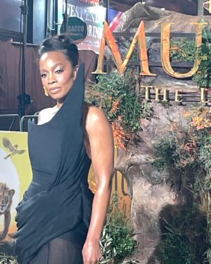 Anika Noni Rose Instagram - The way my team showed out on this @disney #Mufasa press tour has been thoroughly disrespectful.

Before I post ‘beauty shots’, I want to give a moment for this carpet situation. Because it was 32F, and that wind chill was not kind at all, but this looooook?!?! @ashistudio  brought the heat. 

Thank you, @ashistudio for draping me down for this London premiere. You knew only Queen attire would do.

Styled @jasonrembert 
Asst @thestylistguy 
Gown @ashistudio 
Shoes @louboutinworld 
Earrings 

Face @paintedbyesther 
Hair @seraiahartistry 
Color @ryanburrellhair 
 

#mufasa #lionking #milele #afia #fashion #ashistudio  #disney #littleblackdress🧡🦁